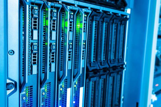 A close up of a server rack with multiple servers photo