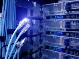 A close up of a network cable in a server room photo