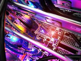 A close up of a computer with many wires photo