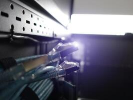 A close up of a computer with wires connected to it photo