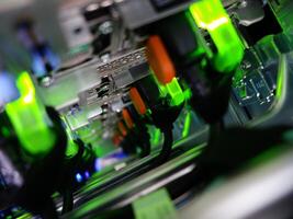 A close up of a computer with green lights photo