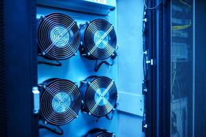 A close up of a computer with several fans photo