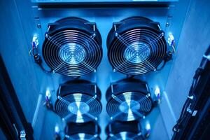 A close up of a computer with several fans photo