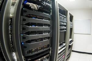 A rack of servers in a data center photo