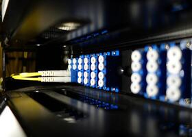 A close up of a computer with a yellow and blue wire photo