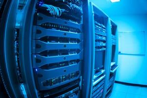 A large rack of servers in a data center photo