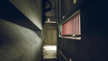 Exploring a dimly lit concrete corridor in an industrial building structure video