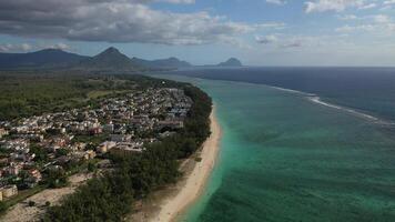 bird's eye view of a suburb with a beautiful white beach on the island of Mauritius photo