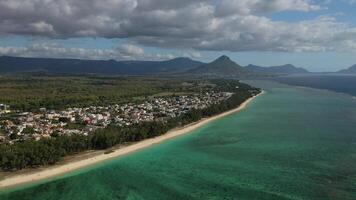 bird's eye view of a suburb with a beautiful white beach on the island of Mauritius. photo