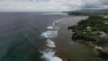 rolling waves and crashing on the coast of Mauritius photo
