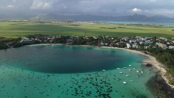 The view from the height on the beautiful beach of blue Bay with boats, Mauritius, photo