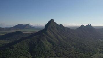 bird's eye view of mountain peaks and green jungles of Mauritius, Africa photo