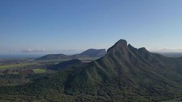bird's eye view of mountain peaks and green jungles of Mauritius, Africa photo
