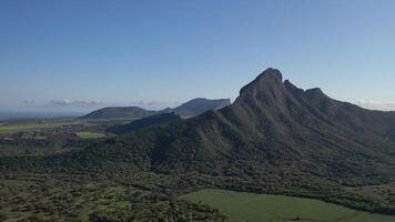 bird's eye view of mountain peaks and green jungles of Mauritius, Africa photo