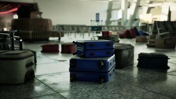Abandoned airport terminal with scattered luggage left behind during closure video