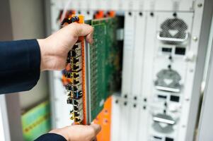 Fix network switch in data center room photo