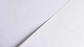 Pearl white designer paper background with a soft gradient and minimalist, glossy texture. This photo