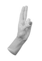 hand with the thumb resting on the pinky and ring fingers, while the index and middle fingers are photo
