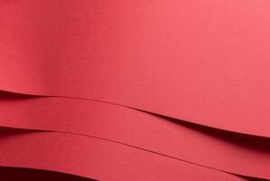 Paper texture background. Premium abstract surface with vibrant red shade, crimson and scarlet tones photo
