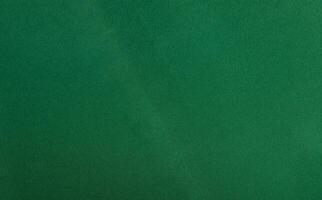 Paper texture background. Premium sheet with elegant, deep emerald shade and monochrome design. photo