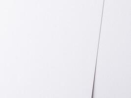 Elegant white background with a subtle abstract pattern, featuring smooth lines and a soft texture. photo