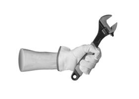 Hand wearing a glove, holding an adjustable wrench, isolated on a white background. The grip shows a photo