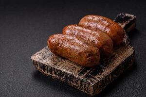 Chicken or pork sausages with salt, spices and herbs photo
