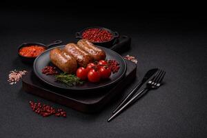 Chicken or pork sausages with salt, spices and herbs photo