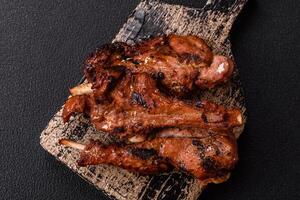 Ribs or rack of beef baked on the grill with salt, spices and herbs photo