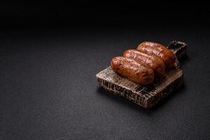Chicken or pork sausages with salt, spices and herbs photo