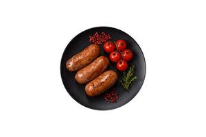 Chicken or pork sausages with salt, spices and herbs photo