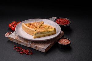 Delicious quiche with broccoli, chicken or salmon and cheese photo