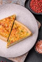 Delicious quiche with broccoli, chicken or salmon and cheese photo