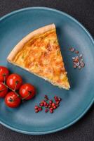 Delicious quiche with broccoli, chicken or salmon and cheese photo