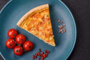 Delicious quiche with broccoli, chicken or salmon and cheese photo