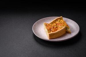 Delicious quiche with broccoli, chicken or salmon and cheese photo