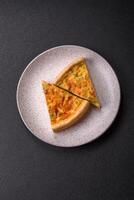Delicious quiche with broccoli, chicken or salmon and cheese photo