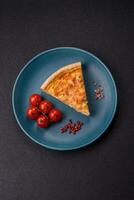 Delicious quiche with broccoli, chicken or salmon and cheese photo