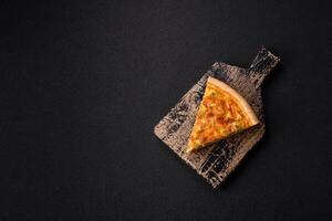 Delicious quiche with broccoli, chicken or salmon and cheese photo