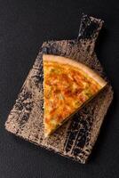 Delicious quiche with broccoli, chicken or salmon and cheese photo