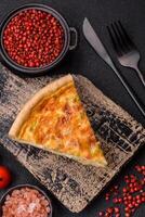 Delicious quiche with broccoli, chicken or salmon and cheese photo