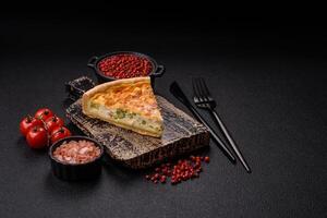 Delicious quiche with broccoli, chicken or salmon and cheese photo