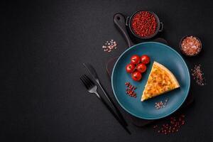 Delicious quiche with broccoli, chicken or salmon and cheese photo