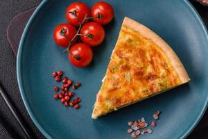 Delicious quiche with broccoli, chicken or salmon and cheese photo
