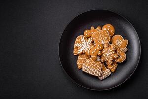 Delicious gingerbread cookies with honey, ginger and cinnamon photo