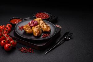 Chicken fillet pieces marinated with salt and spices photo