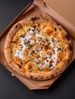 Creamy pizza with truffle cheese, mozzarella, chicken and mushrooms photo