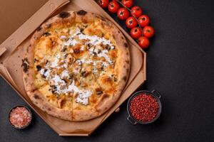 Creamy pizza with truffle cheese, mozzarella, chicken and mushrooms photo
