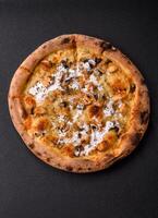 Creamy pizza with truffle cheese, mozzarella, chicken and mushrooms photo