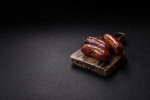Juicy sausages with salt, spices and herbs photo